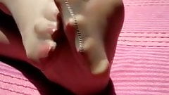 RED TOES IN TAN NYLONS